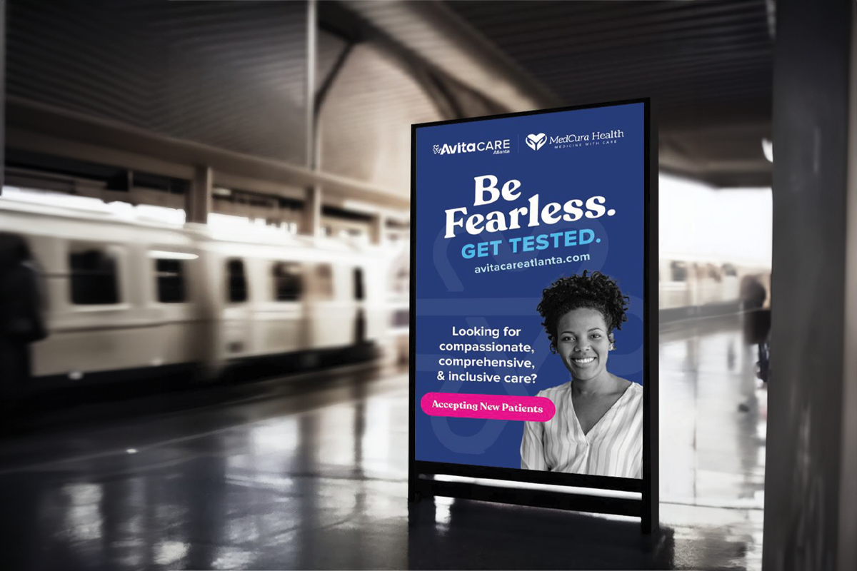 A monochromatic design with bold "Be Fearless. Get Tested." message displayed on a MARTA station floor mounted display.